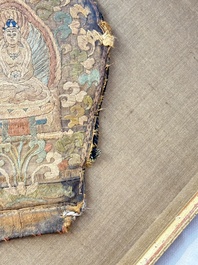 A framed Tibetan silk-embroidered four-leaf ritual crown with Transcendent Buddhas, 18th C.
