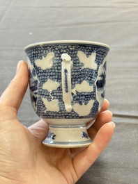 A varied collection of eight Chinese blue and white vases, two teapots and two loving cups, Kangxi/Qianlong