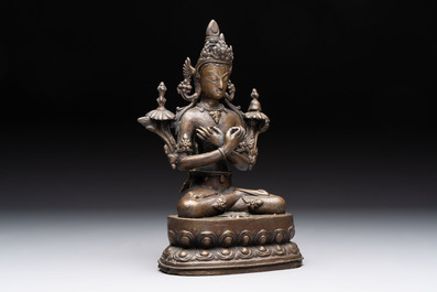A Thai Buddha, a Sino-Tibetan bronze Bodhisattva and a Tibetan bronze and iron phurba, 18/19th C.