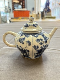 A varied collection of eight Chinese blue and white vases, two teapots and two loving cups, Kangxi/Qianlong