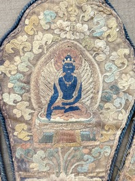 A framed Tibetan silk-embroidered four-leaf ritual crown with Transcendent Buddhas, 18th C.