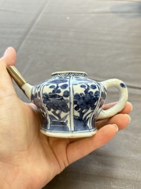 A varied collection of eight Chinese blue and white vases, two teapots and two loving cups, Kangxi/Qianlong