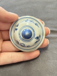 A varied collection of eight Chinese blue and white vases, two teapots and two loving cups, Kangxi/Qianlong