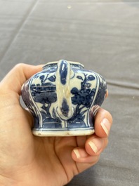 A varied collection of eight Chinese blue and white vases, two teapots and two loving cups, Kangxi/Qianlong