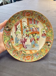 Four Chinese Canton famille rose plates and a covered double-teapot, 19th C.