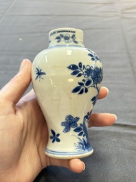 A varied collection of eight Chinese blue and white vases, two teapots and two loving cups, Kangxi/Qianlong