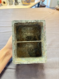 A Chinese archaic bronze inscribed wine vessel with buffalo design, 'fangyi 方彝', Western Zhou