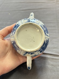 A varied collection of eight Chinese blue and white vases, two teapots and two loving cups, Kangxi/Qianlong