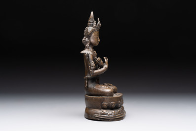 A Thai Buddha, a Sino-Tibetan bronze Bodhisattva and a Tibetan bronze and iron phurba, 18/19th C.