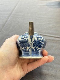 A varied collection of eight Chinese blue and white vases, two teapots and two loving cups, Kangxi/Qianlong