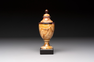 An English Blue John urn on black marble base, ca. 1900