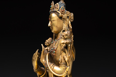 A fine Sino-Tibetan turquoise- and coral-inlaid gilt-bronze Buddha Maitreya, Kangxi