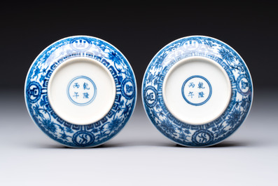 A pair of Chinese blue and white saucer dishes, Qianlong mark, 19th C.