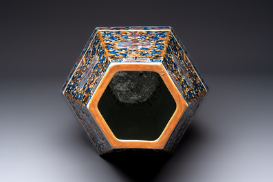 A rare Chinese hexagonal copper-red, blue and white brown-ground vase, 19th C.