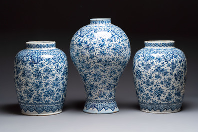 An exceptional large blue and white Dutch Delft garniture of three vases, late 17th/early 18th C.