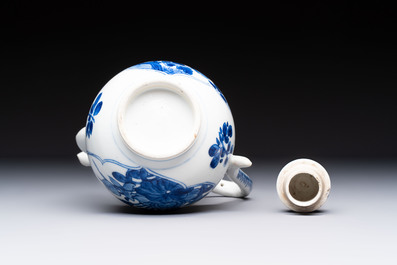A Chinese blue and white ewer and cover with floral design, Kangxi