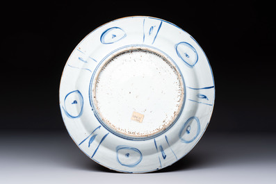 Two Chinese blue and white 'kraak' dishes and four plates, Wanli