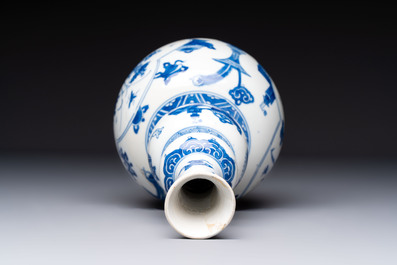 A Chinese blue and white double gourd 'Antiquities' vase, Kangxi