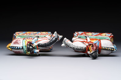 A pair of polychrome Dutch Delft petit feu models of horses with riders, 18th C.