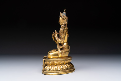 A fine Sino-Tibetan turquoise- and coral-inlaid gilt-bronze Buddha Maitreya, Kangxi