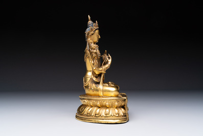 A fine Sino-Tibetan turquoise- and coral-inlaid gilt-bronze Buddha Maitreya, Kangxi