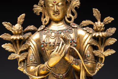 A fine Sino-Tibetan turquoise- and coral-inlaid gilt-bronze Buddha Maitreya, Kangxi