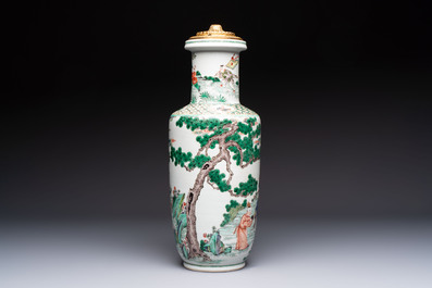 A fine Chinese famille verte 'Sanxing' rouleau vase with a gilt-bronze mount, Qing