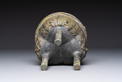 A Chinese archaic bronze food vessel with Taotie design, 'Ding 鼎', late Shang