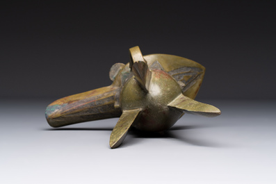 A Chinese archaic bronze wine vessel, 'jue 爵', late Shang