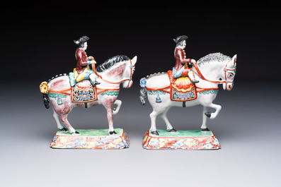A pair of polychrome Dutch Delft petit feu models of horses with riders, 18th C.