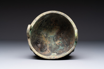 A Chinese archaic bronze food vessel with Taotie design, 'Ding 鼎', late Shang