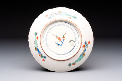 A Japanese Kakiemon-style 'Three Friends of Winter' plate, Edo, late 17/18th C.