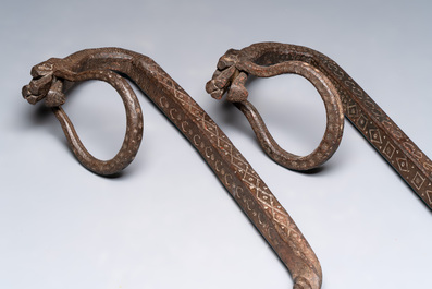 A pair of wrought iron elements, possibly Hispano-Moresque, 16th C.