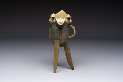 A Chinese archaic bronze wine vessel, 'jue 爵', late Shang
