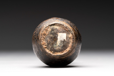 A small Chinese bronze vase with a chilong on a wooden stand, Yuan