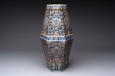 A rare Chinese hexagonal copper-red, blue and white brown-ground vase, 19th C.