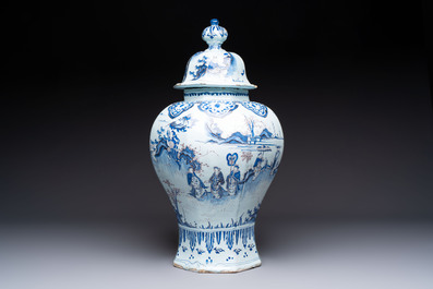 An exceptional blue, white and manganese Dutch Delft Transitional style chinoiserie vase and cover, 17th C.