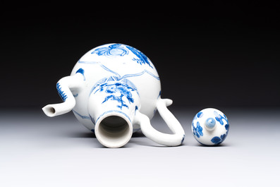 A Chinese blue and white ewer and cover with floral design, Kangxi