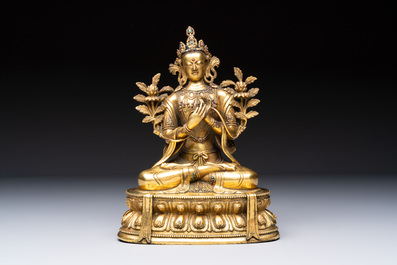 A fine Sino-Tibetan turquoise- and coral-inlaid gilt-bronze Buddha Maitreya, Kangxi