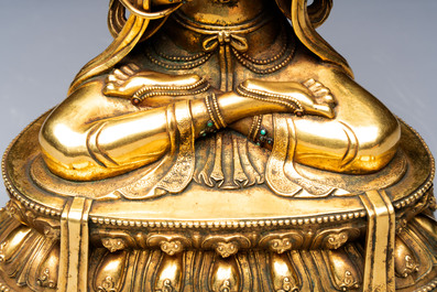 A fine Sino-Tibetan turquoise- and coral-inlaid gilt-bronze Buddha Maitreya, Kangxi