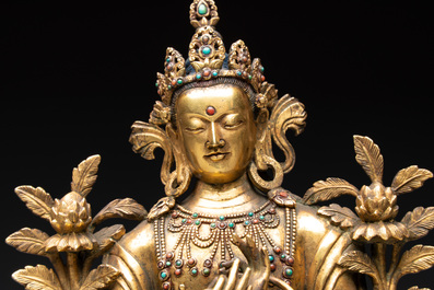 A fine Sino-Tibetan turquoise- and coral-inlaid gilt-bronze Buddha Maitreya, Kangxi