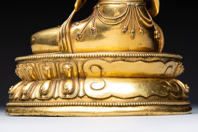 A fine Sino-Tibetan turquoise- and coral-inlaid gilt-bronze Buddha Maitreya, Kangxi