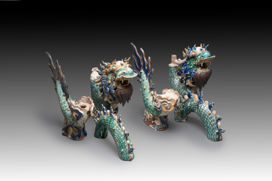 A pair of large Chinese polychrome-glazed Shiwan stoneware dragons, 19th C.