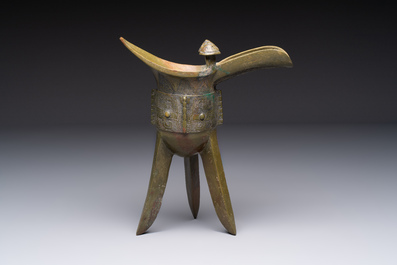 A Chinese archaic bronze wine vessel, 'jue 爵', late Shang