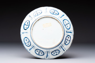 Two Chinese blue and white 'kraak' dishes and four plates, Wanli