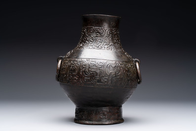 A Chinese archaistic bronze 'hu' vase with chilong design, Song/Yuan
