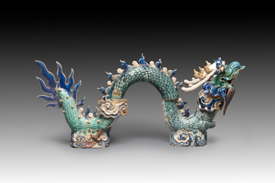 A pair of large Chinese polychrome-glazed Shiwan stoneware dragons, 19th C.