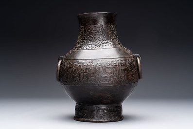 A Chinese archaistic bronze 'hu' vase with chilong design, Song/Yuan