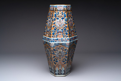 A rare Chinese hexagonal copper-red, blue and white brown-ground vase, 19th C.