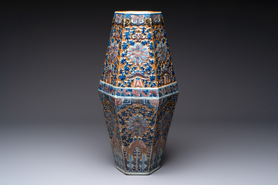 A rare Chinese hexagonal copper-red, blue and white brown-ground vase, 19th C.